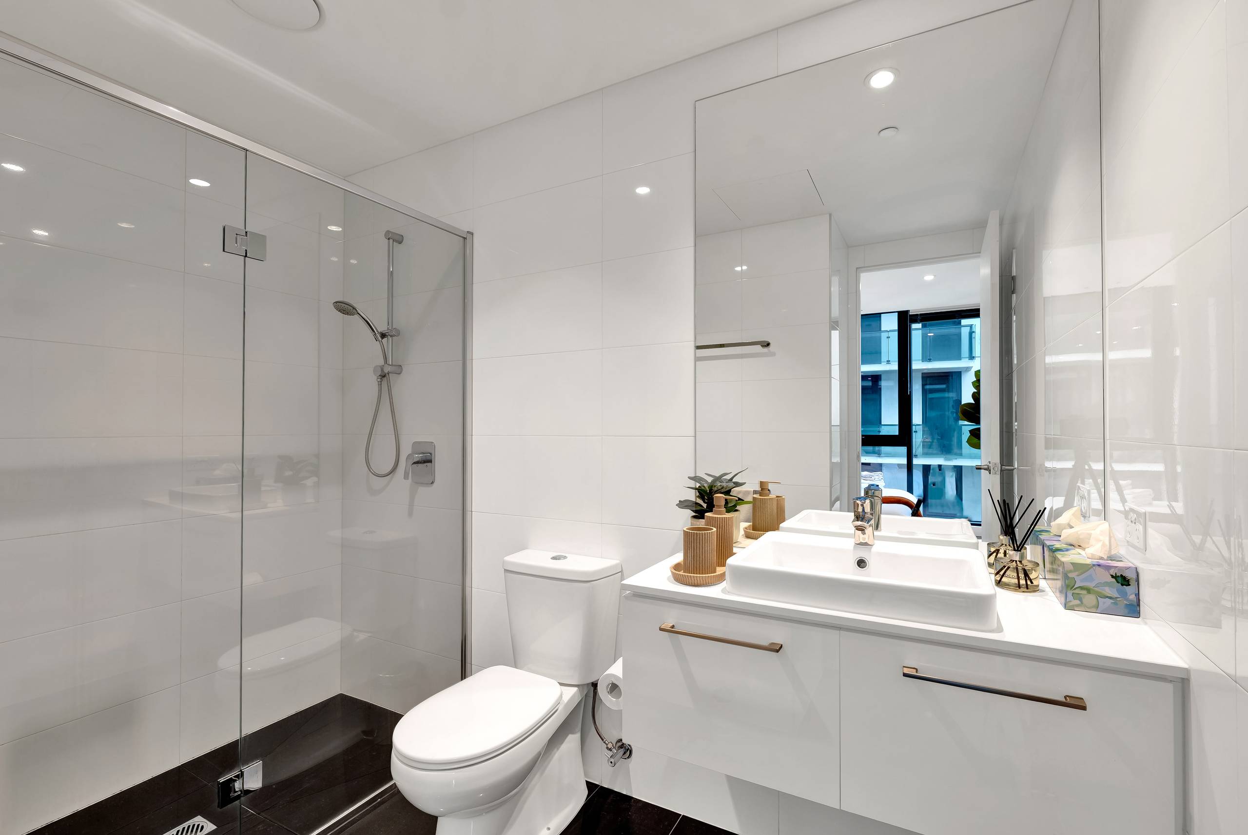 Aurora: ensuite — the master bedroom’s own walk-in shower, with hotel-grade towels
