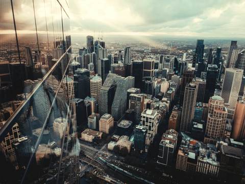The city centre seen from high above Southbank, through the glass of the observation deck.