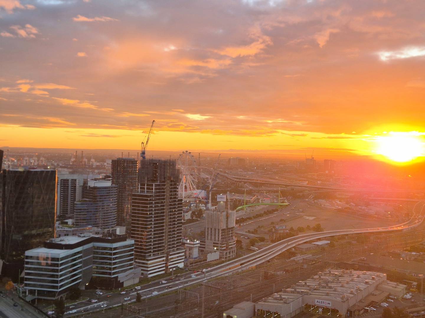 Spencer: view at sunset — the sun going down over Docklands, seen from Level 34